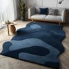 Handmade Wool Tufted Rug: Burnt Sky & Soft Blue Floral Design