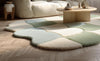 Handmade Wool Tufted Rug: Soft Pastel Wavy Patchwork