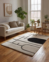 Handmade Geometric Tufted Wool Rug: Black and White Abstract Design (6x9 ft