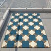 Modern Blue Checkered Area Rug: Geometric Living Room Design