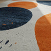 Modern Abstract Area Rug: Cream, Orange & Navy Circle Design
