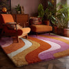 Handmade Tufted Wool Area Rug: Retro 70s Wavy Design